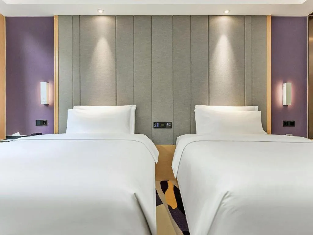 Bed in Lavande Hotel·Xishuangbanna Jinghong Songkran Square