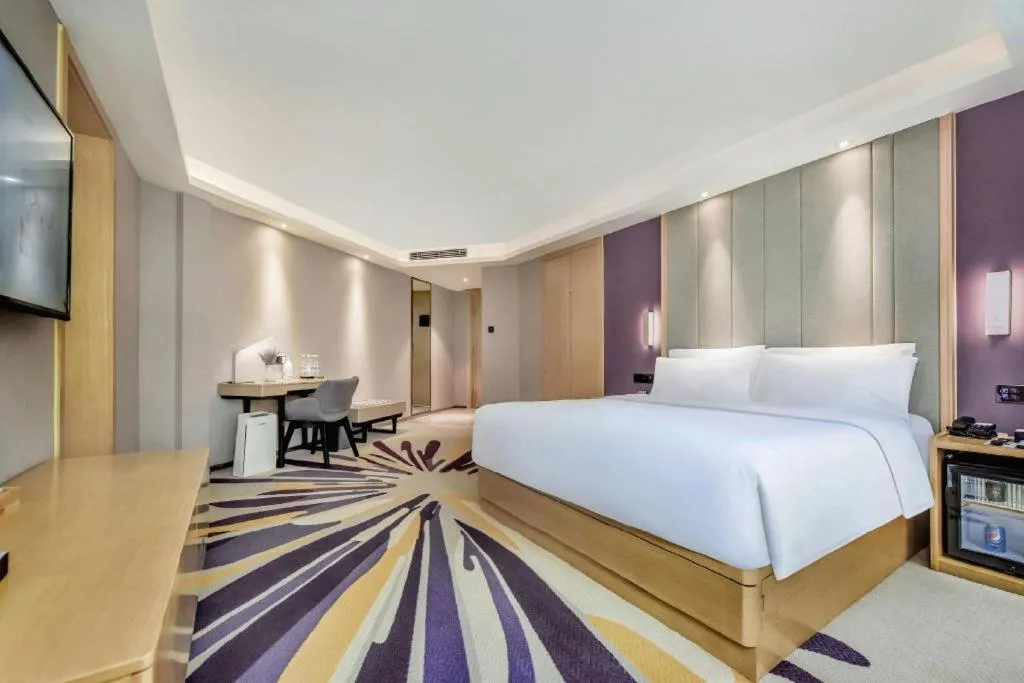 Bed in Lavande Hotel·Xishuangbanna Jinghong Songkran Square