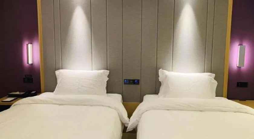 Bed in Lavande Hotel·Xishuangbanna Jinghong Songkran Square