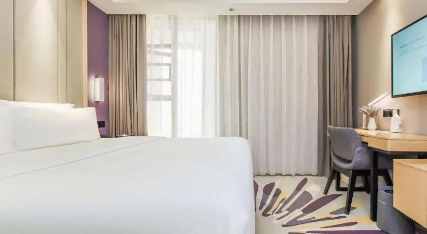 Bed in Lavande Hotel·Xishuangbanna Jinghong Songkran Square