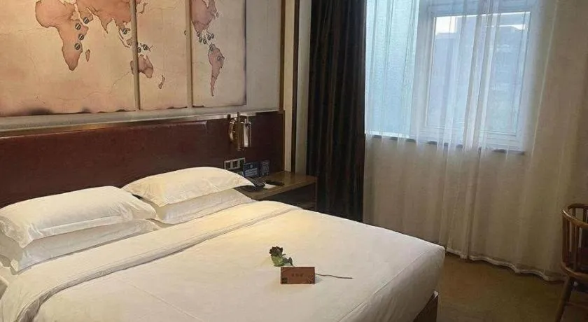 Bed in James Joyce Coffetel Beijing Yizhuang Rongjing East Street Subway Station