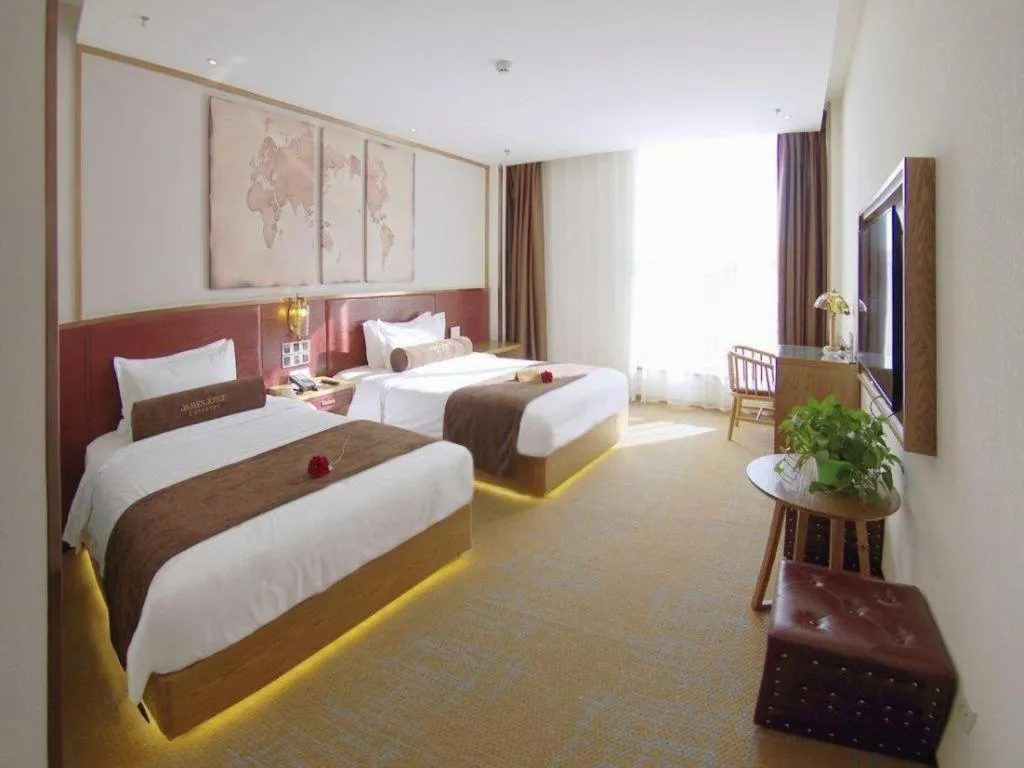 Bed in James Joyce Coffetel Beijing Yizhuang Rongjing East Street Subway Station