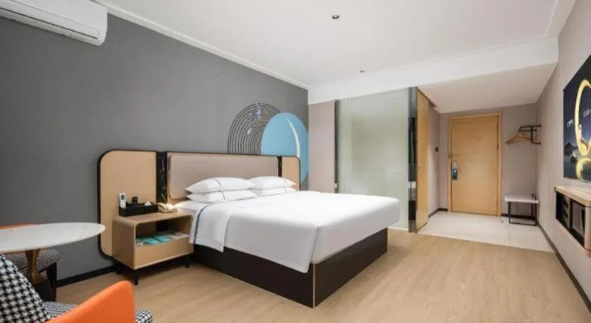 Bed in City Comfort Inn Chibi Railway Station