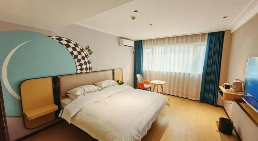 Bed in City Comfort Inn Chibi Railway Station