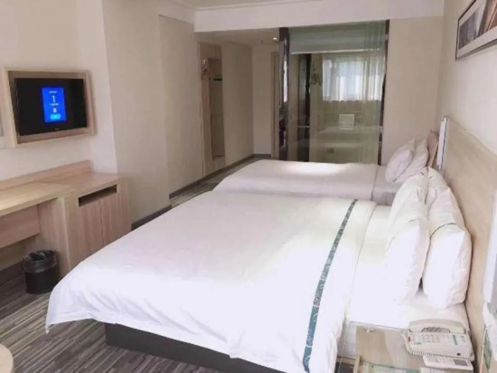 Bed in City Comfort Inn Chibi Railway Station