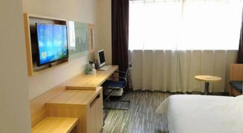 Bed in City Comfort Inn Chibi Railway Station