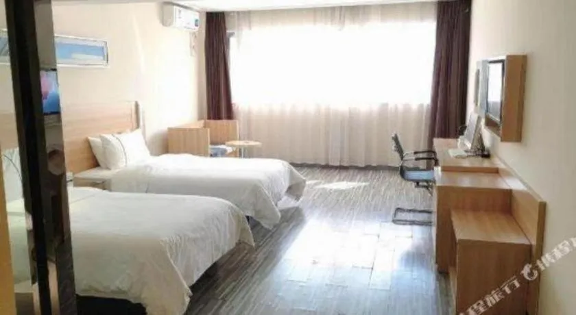 Bed in City Comfort Inn Chibi Railway Station