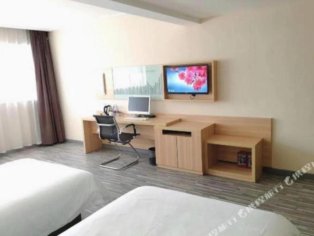 Bed in City Comfort Inn Chibi Railway Station