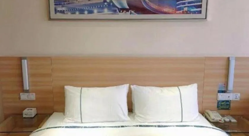 Bed in City Comfort Inn Chibi Railway Station