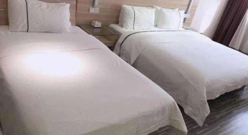 Bed in City Comfort Inn Chibi Railway Station