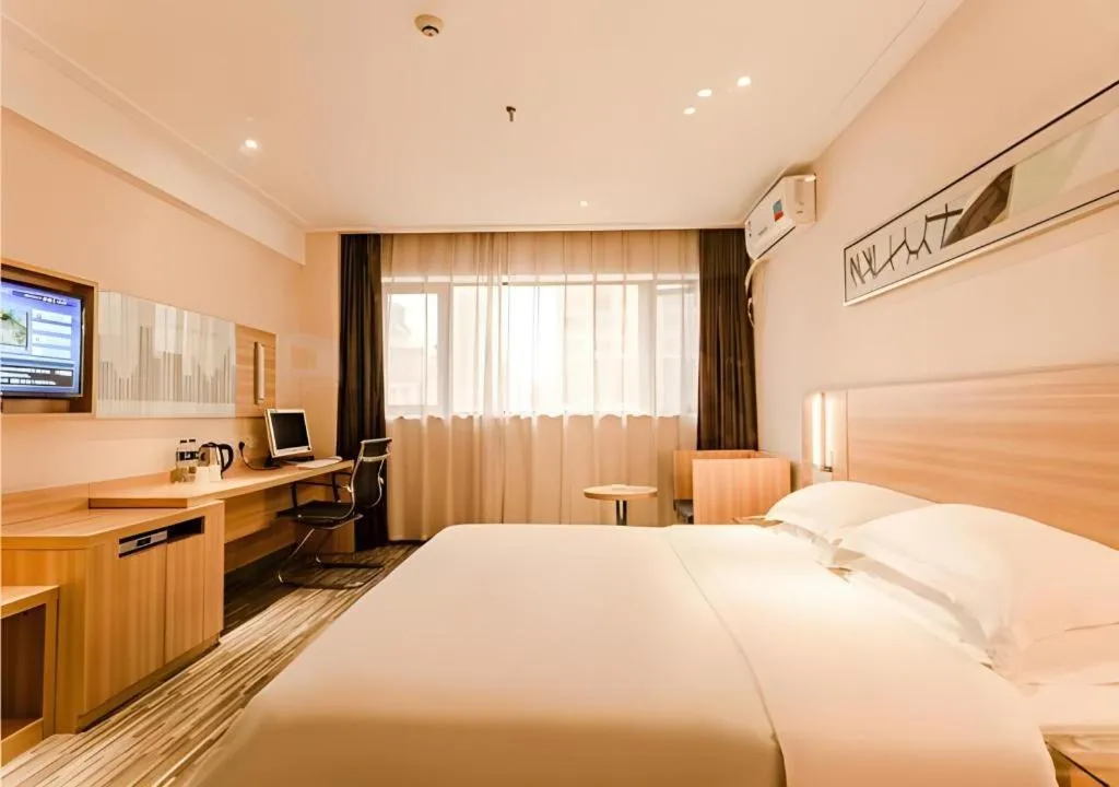 Bed in City Comfort Inn Chibi Railway Station