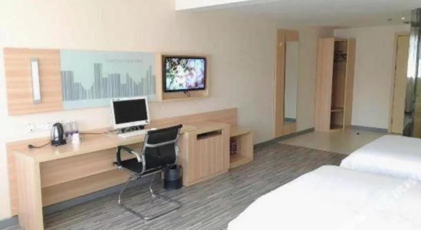 Bed in City Comfort Inn Chibi Railway Station