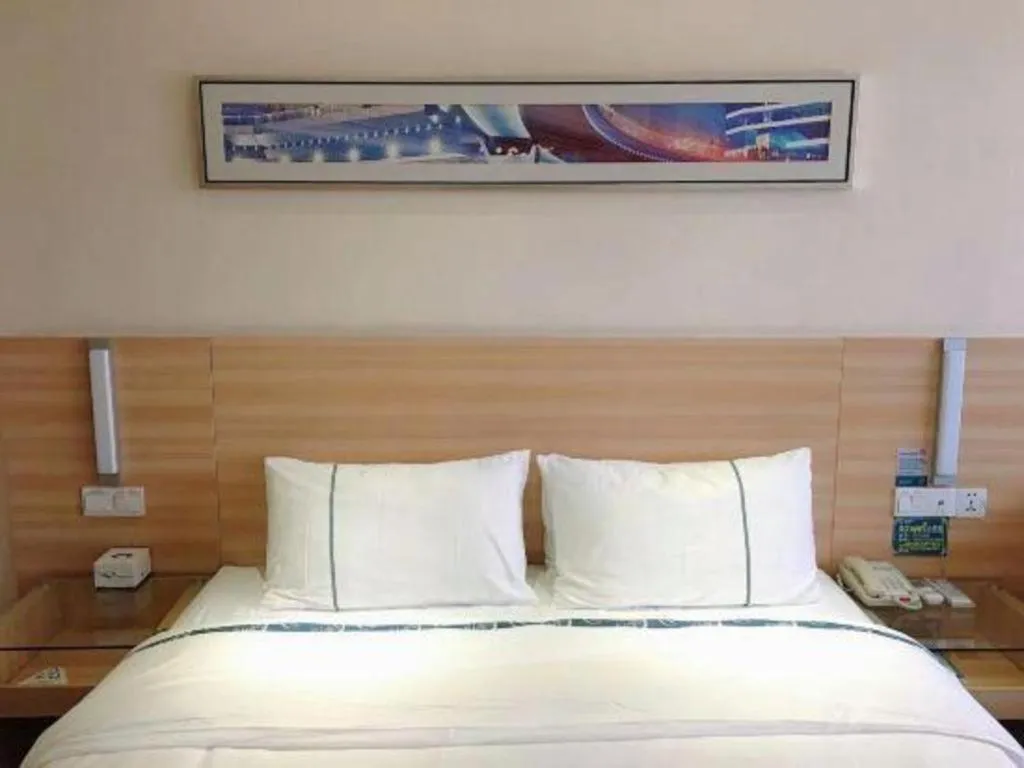 Bed in City Comfort Inn Chibi Railway Station