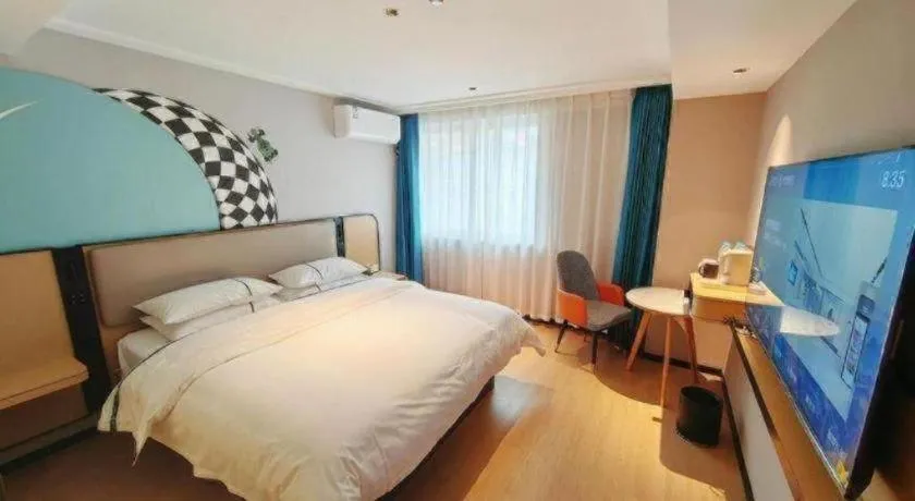 Bed in City Comfort Inn Chibi Railway Station