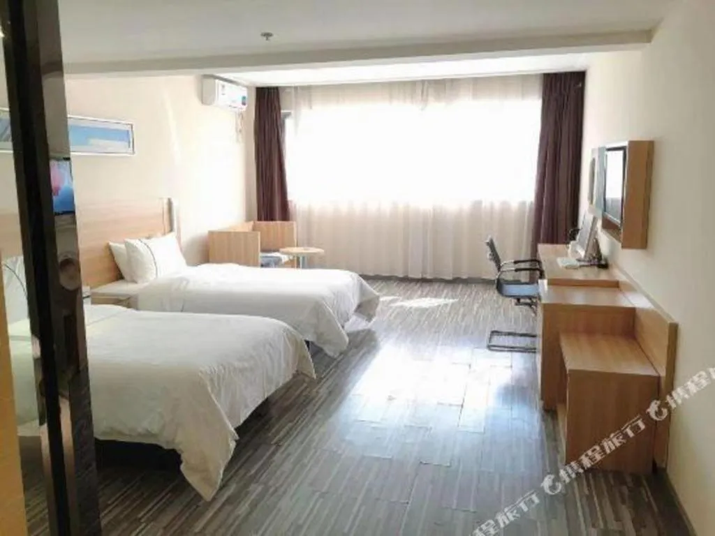 Bed in City Comfort Inn Chibi Railway Station