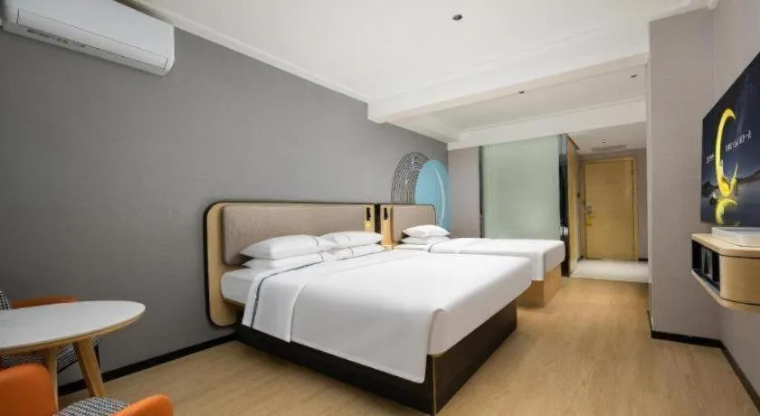 Bed in City Comfort Inn Chibi Railway Station