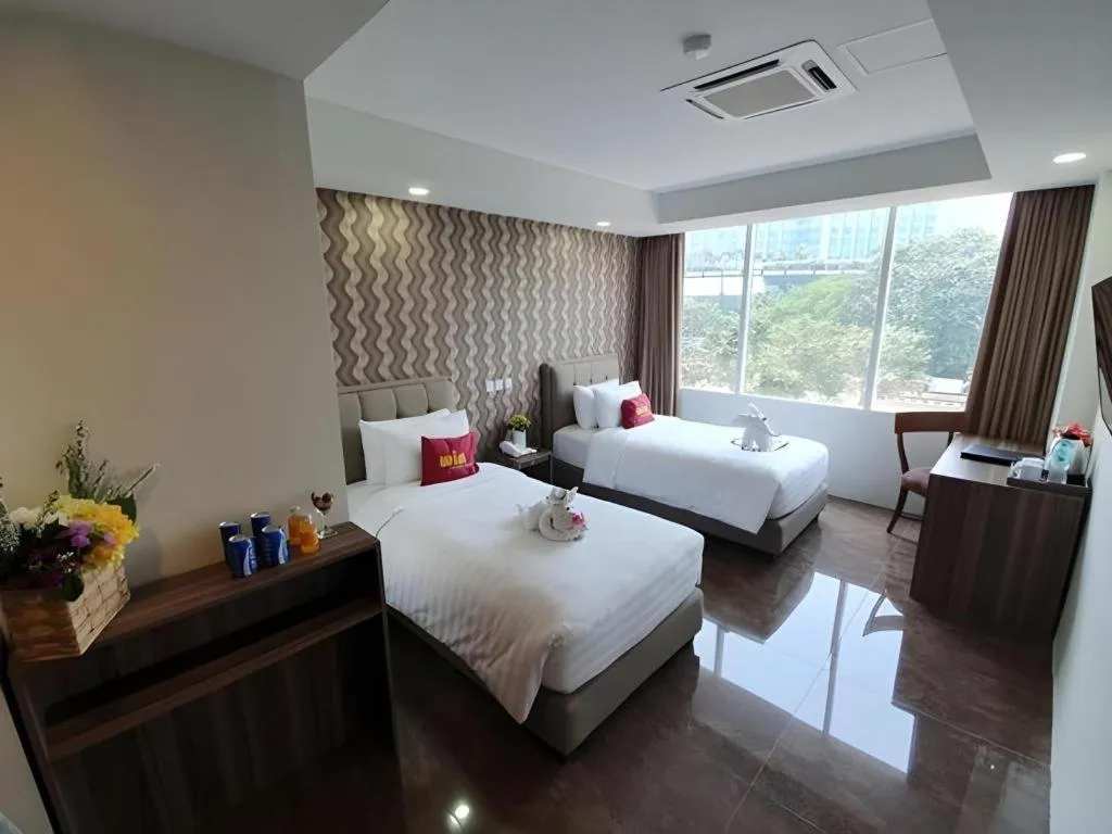 Bed in Win Premier Hotel Mangga Besar