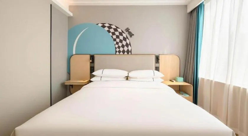 Bed in City Comfort Inn Nanning Guangxi University