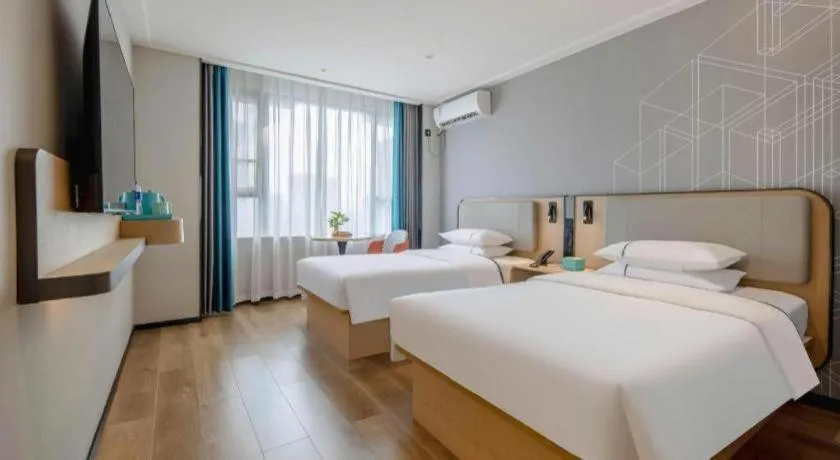 Bed in City Comfort Inn Nanning Guangxi University