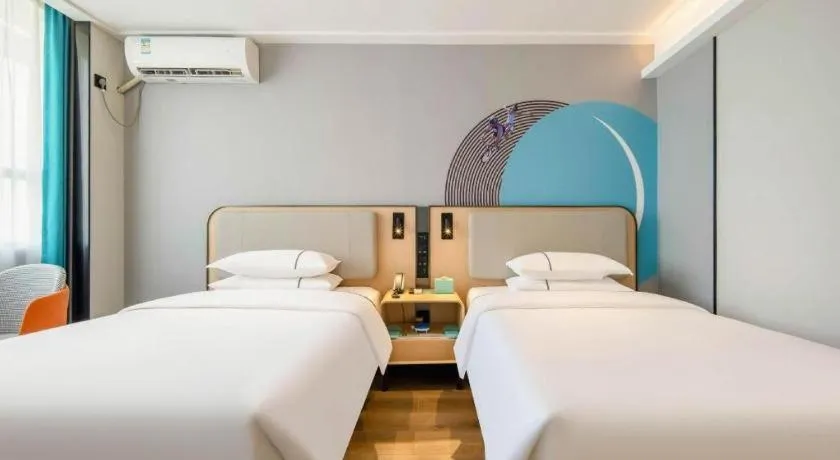 Bed in City Comfort Inn Nanning Guangxi University