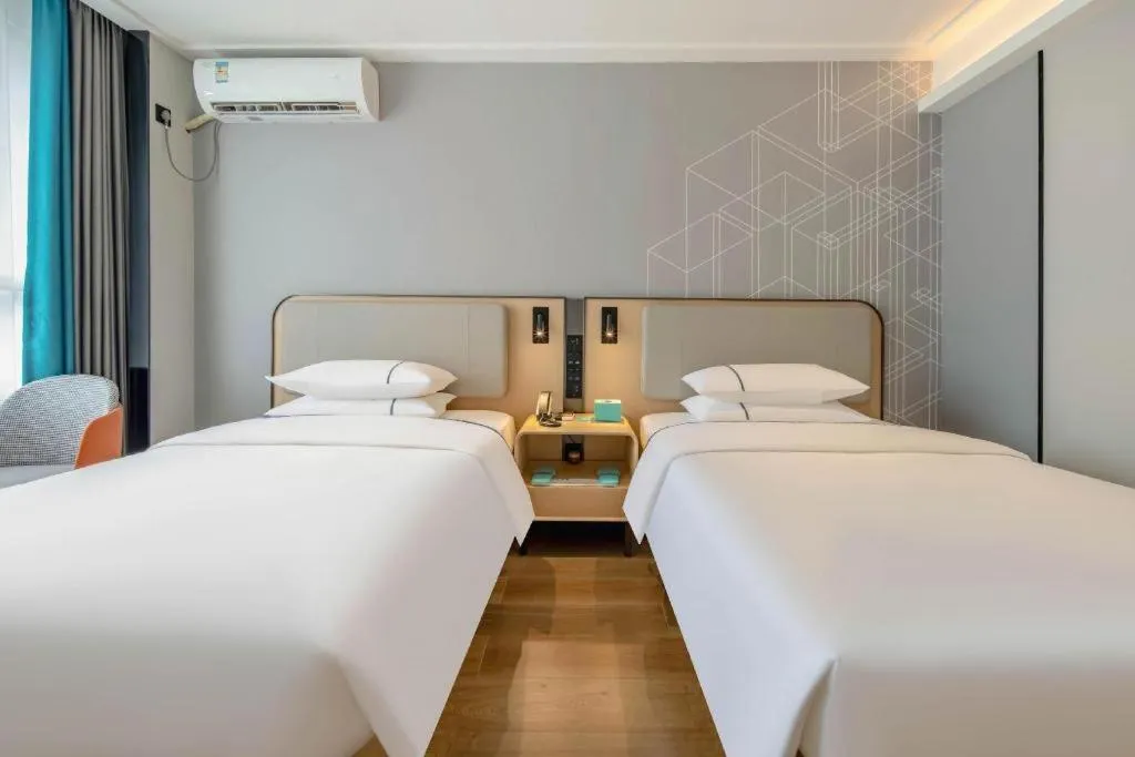 Bed in City Comfort Inn Nanning Guangxi University