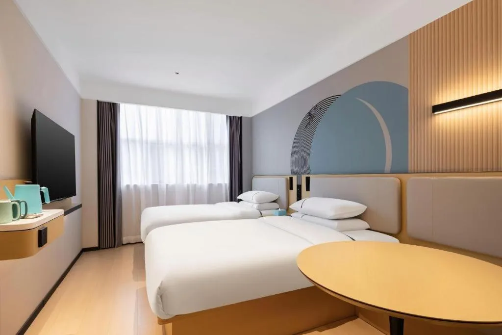 Bed in City Comfort Inn Nanning Guangxi University