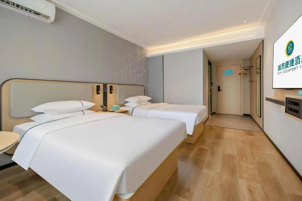 Bed in City Comfort Inn Nanning Guangxi University