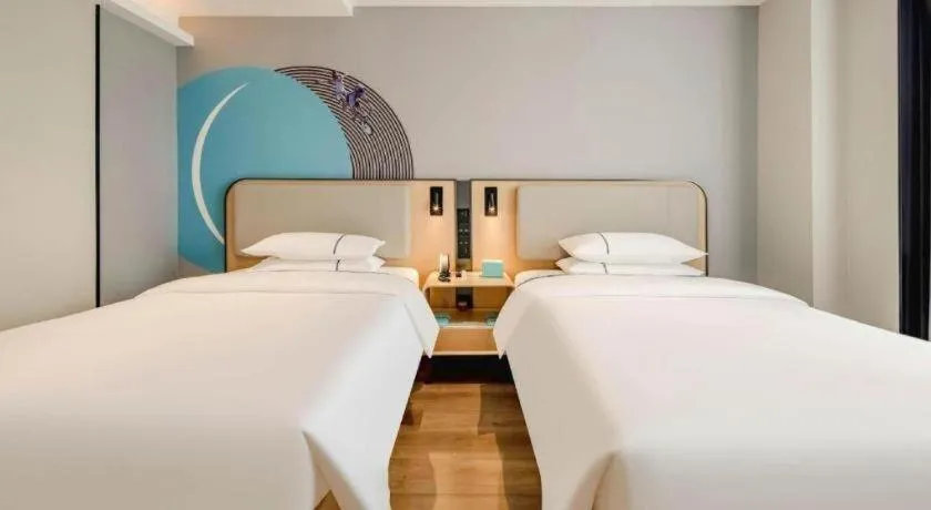 Bed in City Comfort Inn Nanning Guangxi University