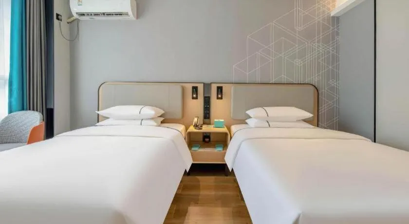 Bed in City Comfort Inn Nanning Guangxi University