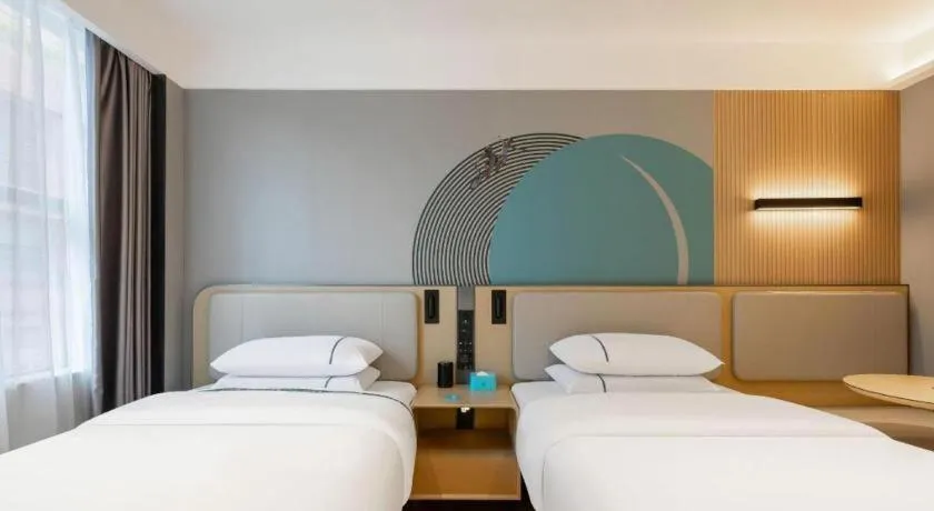 Bed in City Comfort Inn Nanning Guangxi University