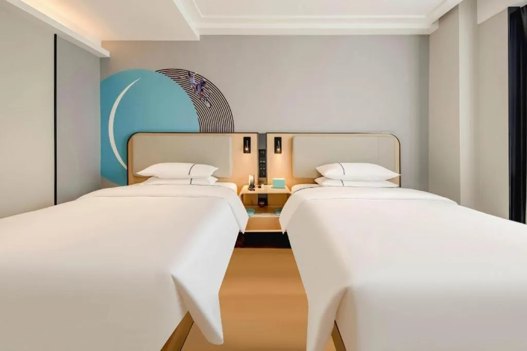 Bed in City Comfort Inn Nanning Guangxi University