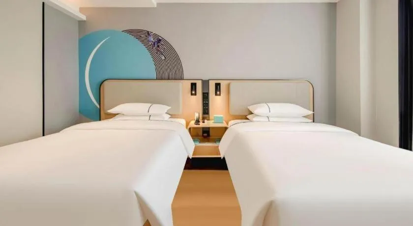 Bed in City Comfort Inn Nanning Guangxi University