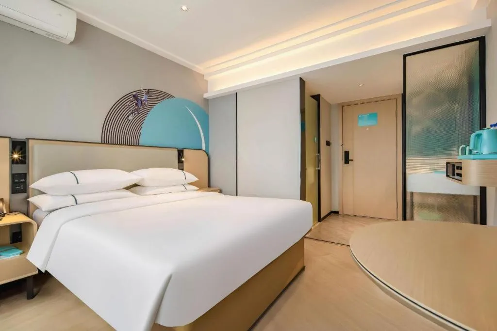 Bed in City Comfort Inn Nanning Guangxi University