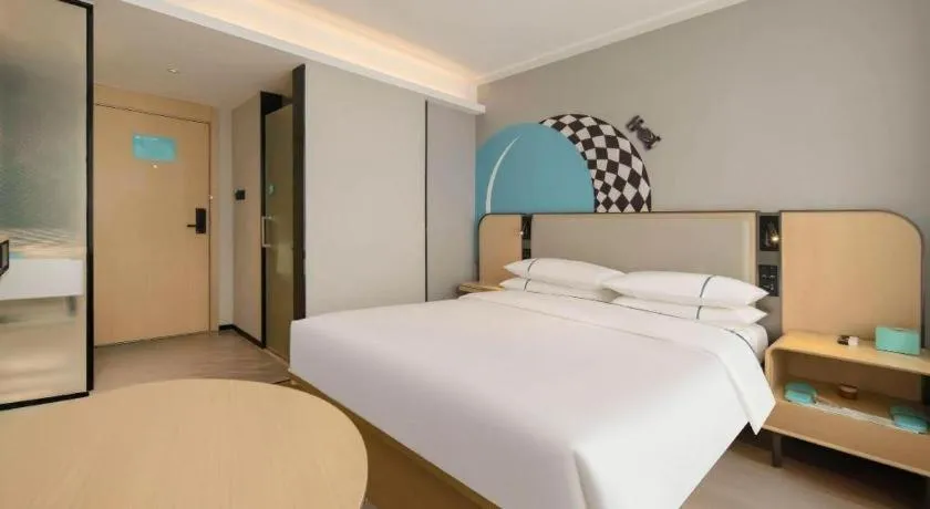 Bed in City Comfort Inn Nanning Guangxi University