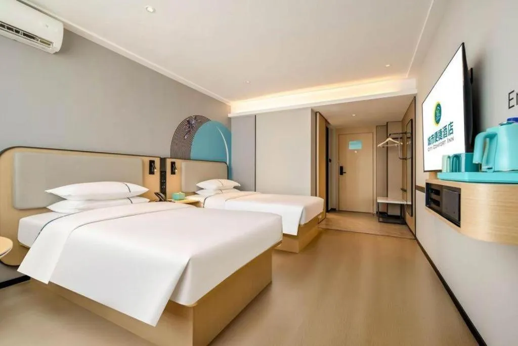 Bed in City Comfort Inn Nanning Guangxi University