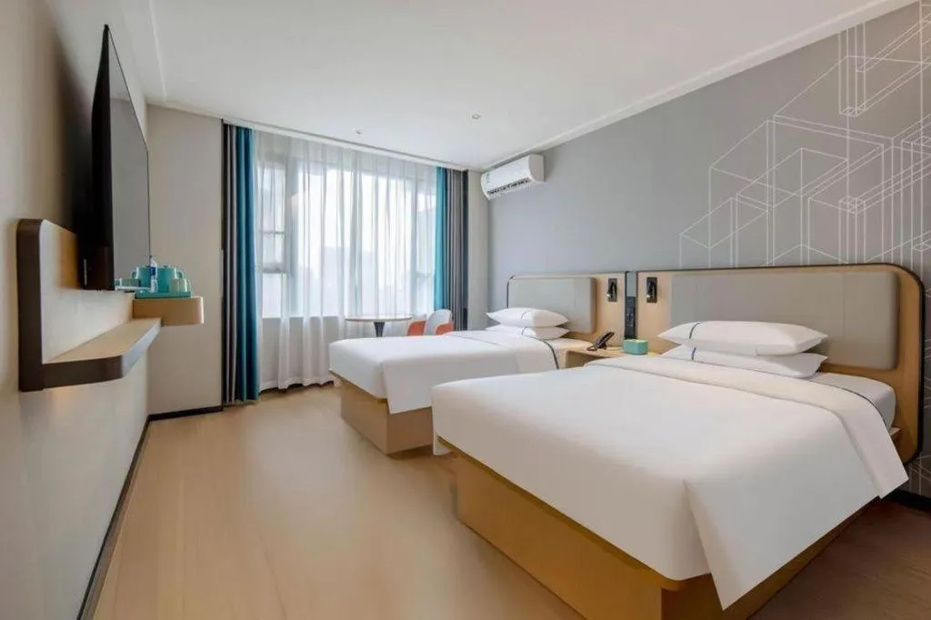 Bed in City Comfort Inn Nanning Guangxi University