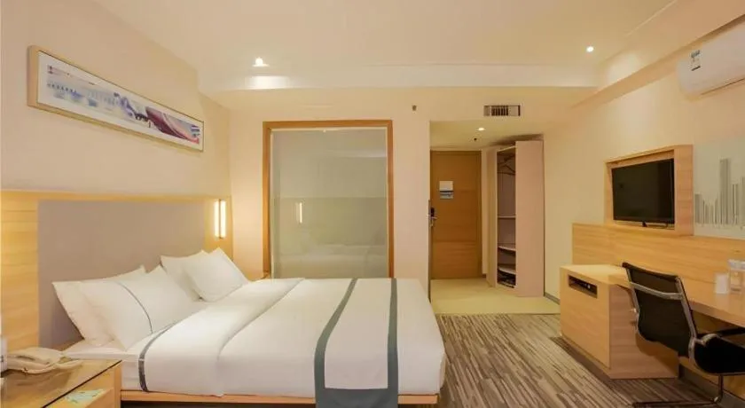 Bed in City Comfort Inn Nanning Guangxi University