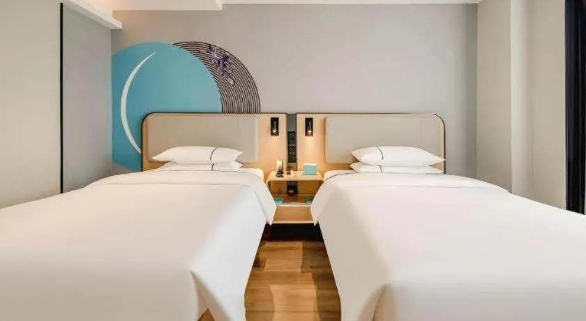 Bed in City Comfort Inn Nanning Guangxi University