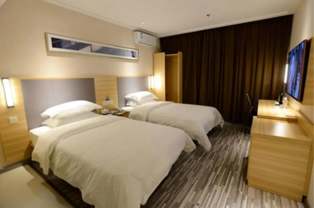 Bed in City Comfort Inn Nanning Guangxi University