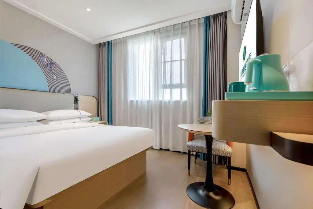 Bed in City Comfort Inn Nanning Guangxi University