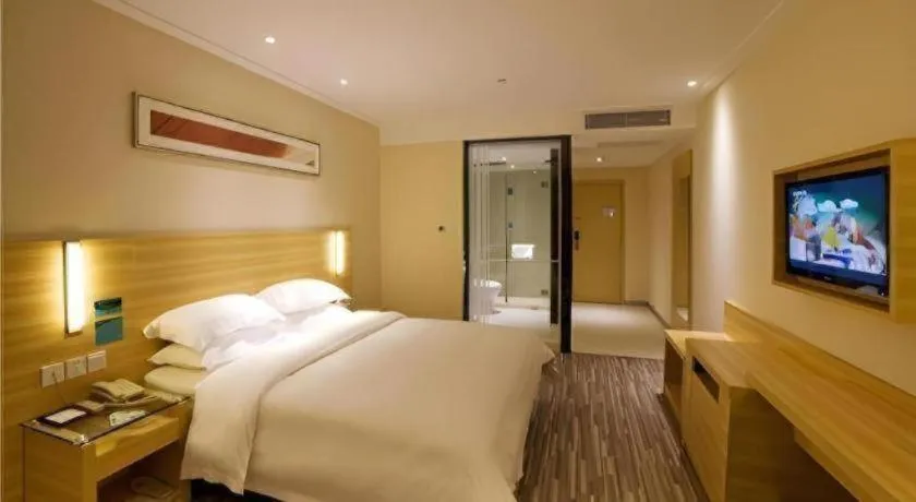Bed in City Comfort Inn Zhongshan Shaxi Starbao Rosewood Expo City