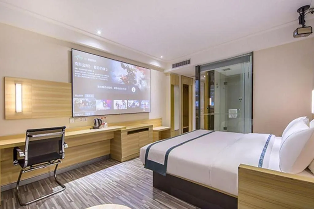 Bed in City Comfort Inn Zhongshan Shaxi Starbao Rosewood Expo City