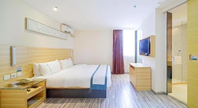 Bed in City Comfort Inn Zhongshan Shaxi Starbao Rosewood Expo City