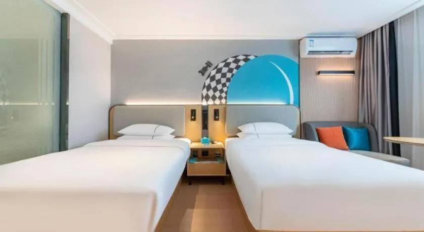 Bed in City Comfort Inn Zhongshan Shaxi Starbao Rosewood Expo City