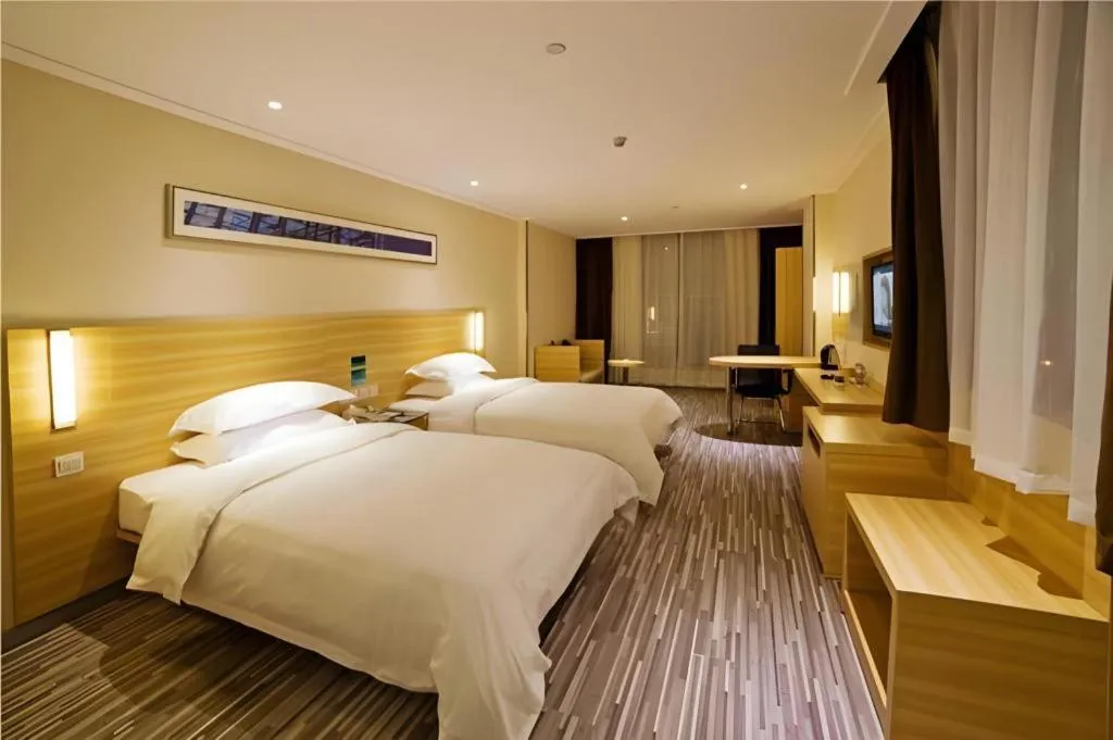 Bed in City Comfort Inn Zhongshan Shaxi Starbao Rosewood Expo City