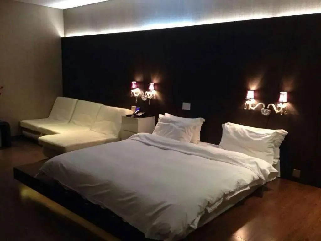 Bed in Qingdao Hengbo Hotel