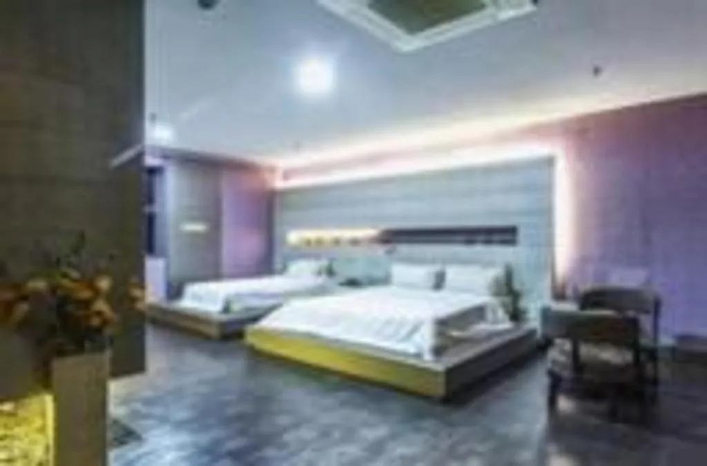 Bed in Qingdao Hengbo Hotel