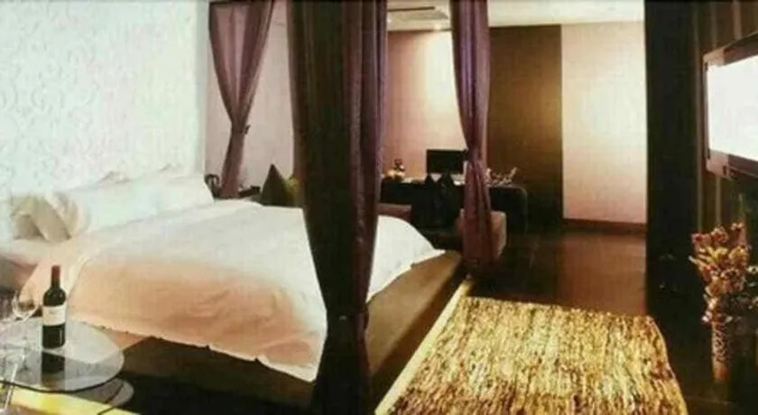 Bed in Qingdao Hengbo Hotel