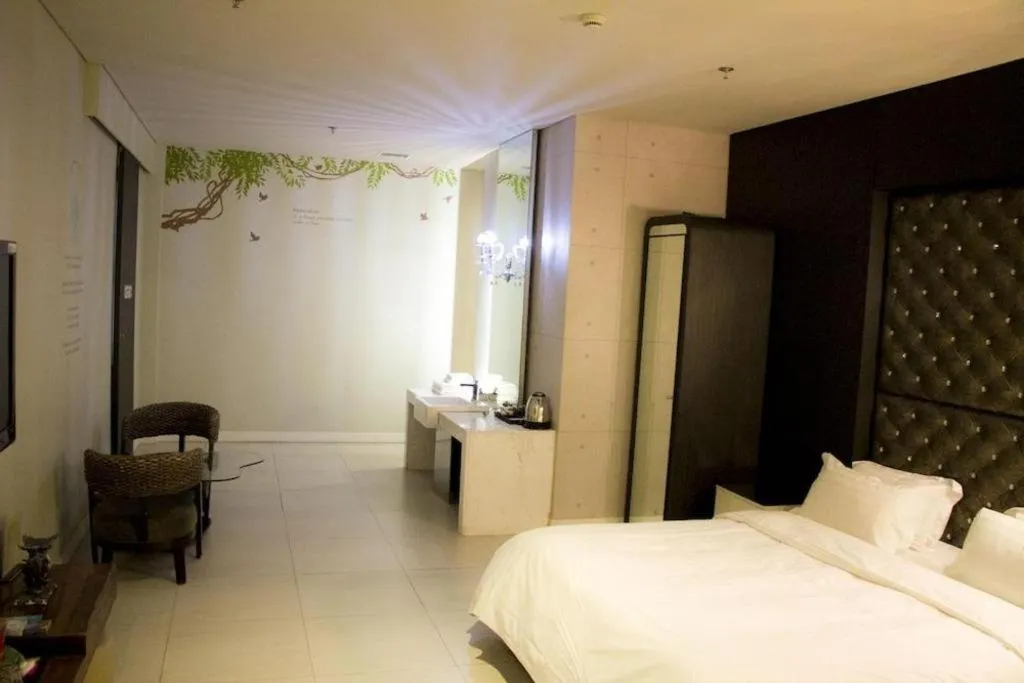 Bed in Qingdao Hengbo Hotel