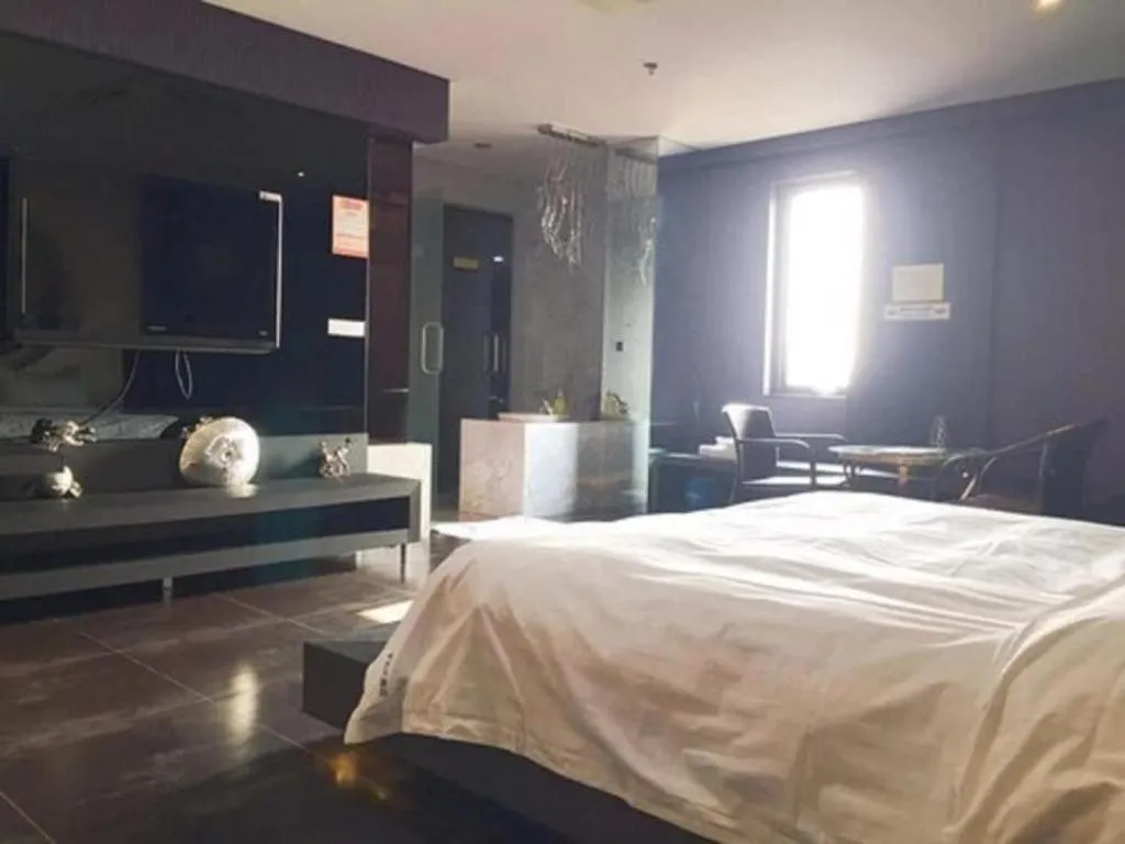 Bed in Qingdao Hengbo Hotel